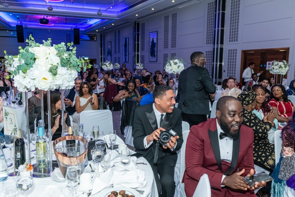 Guests seated at decorated tables during the awards ceremony